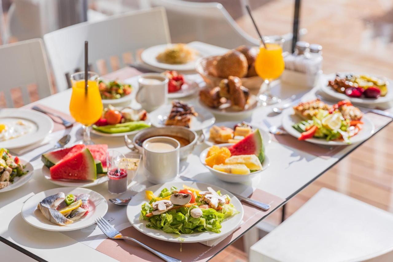 Enjoy Dead Sea Hotel Ein Bokek Exterior photo A breakfast buffet