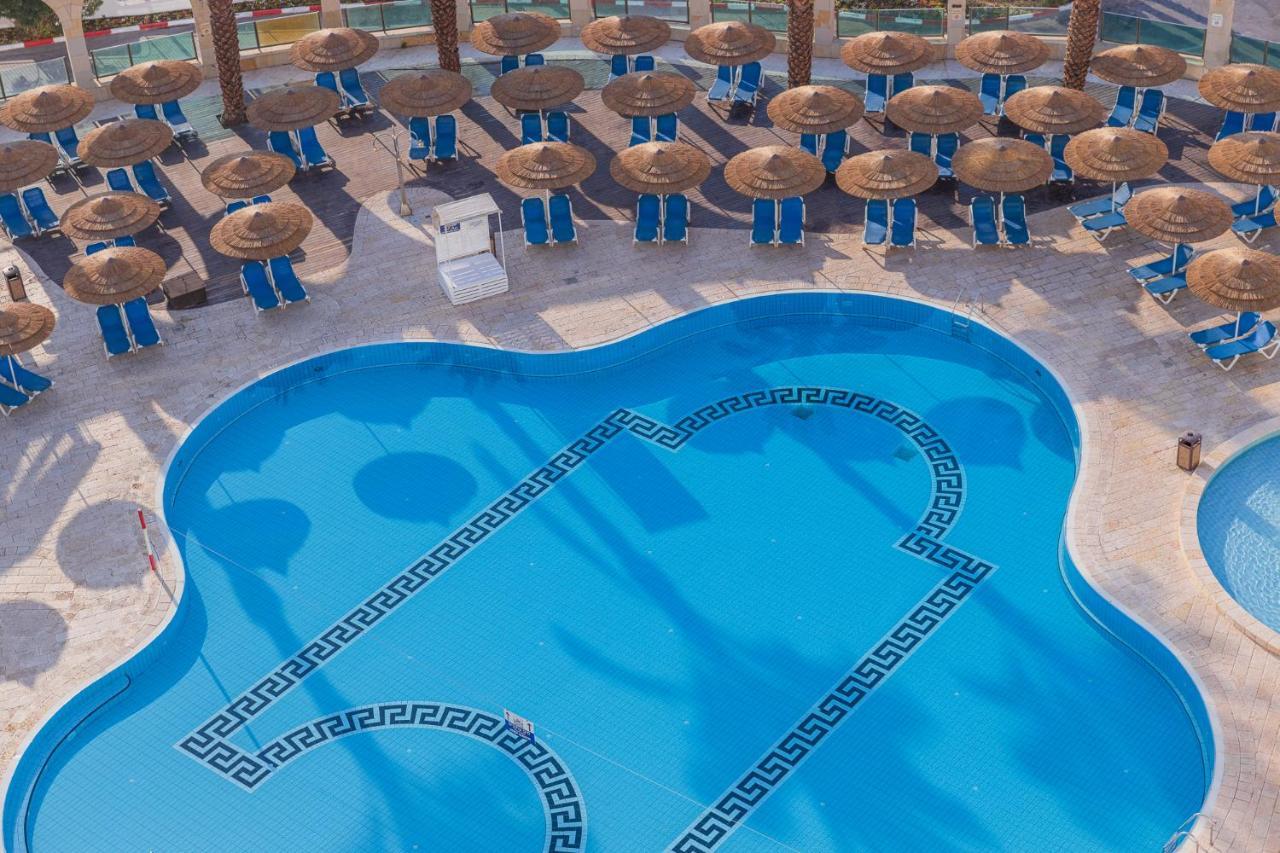 Enjoy Dead Sea Hotel Ein Bokek Exterior photo The pool at the hotel