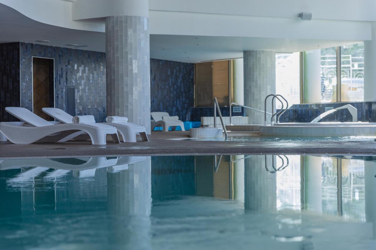 Enjoy Dead Sea Hotel Ein Bokek Exterior photo The swimming pool at the hotel