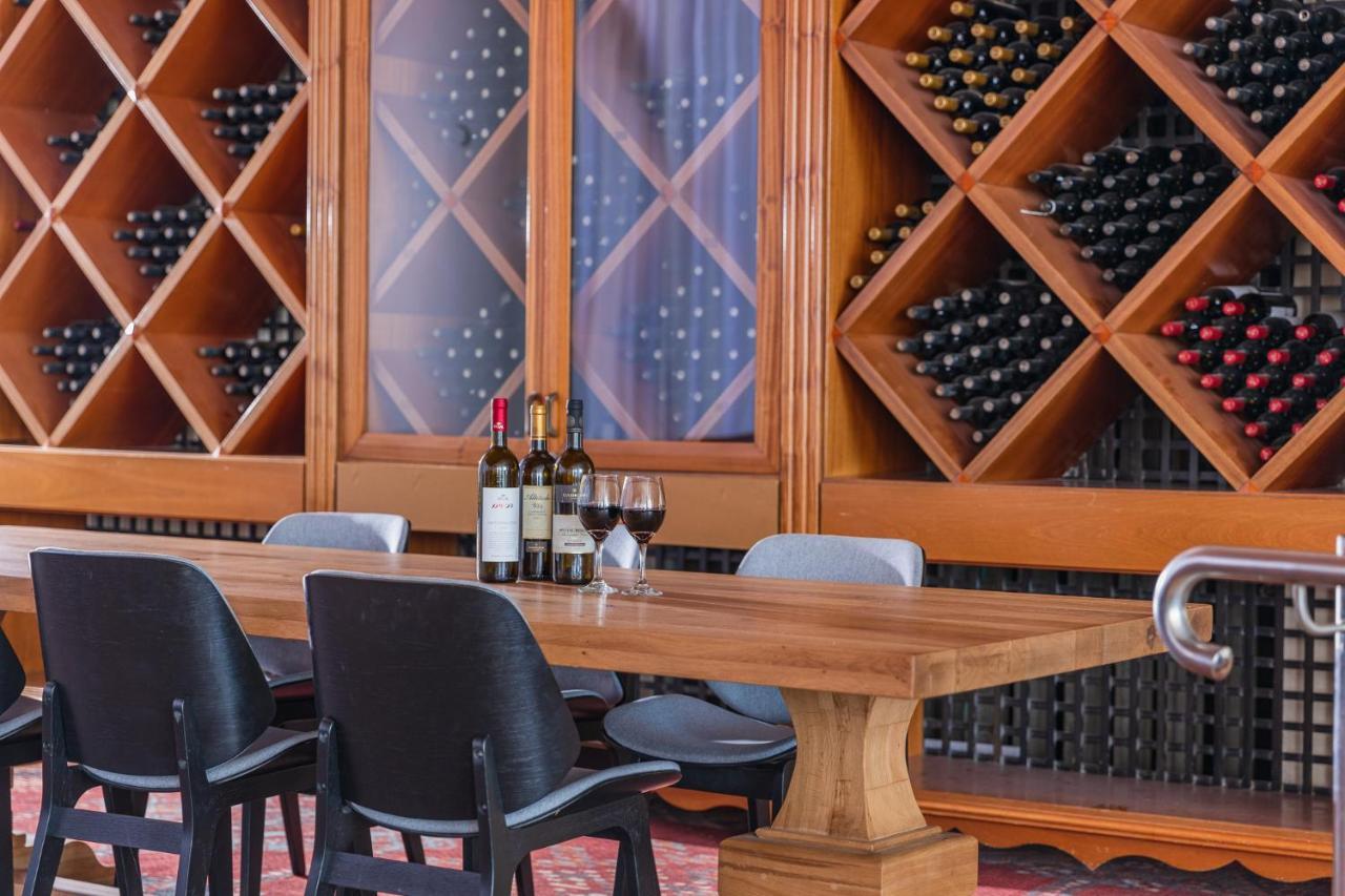 Enjoy Dead Sea Hotel Ein Bokek Exterior photo Wine tasting at the winery