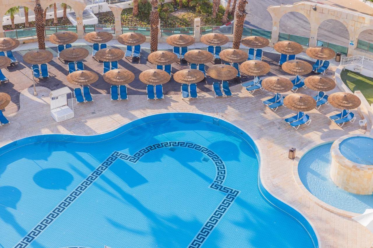 Enjoy Dead Sea Hotel Ein Bokek Exterior photo The pool at the Atlantis Paradise Island