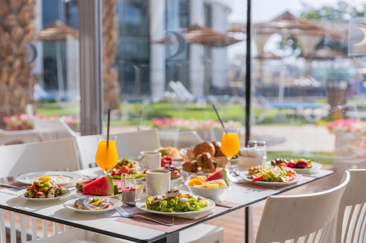 Enjoy Dead Sea Hotel Ein Bokek Exterior photo Breakfast at the hotel