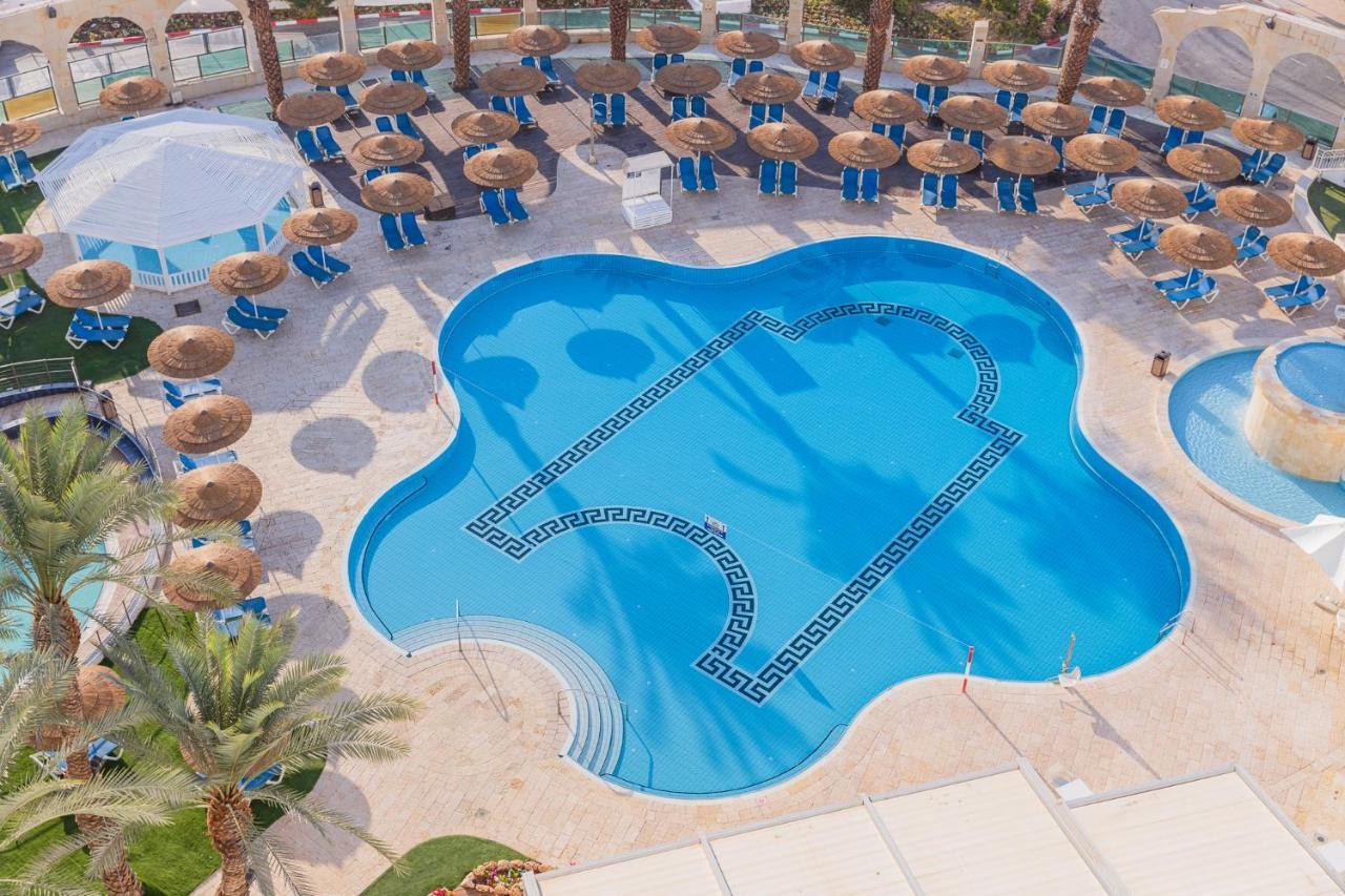 Enjoy Dead Sea Hotel Ein Bokek Exterior photo The pool at the hotel